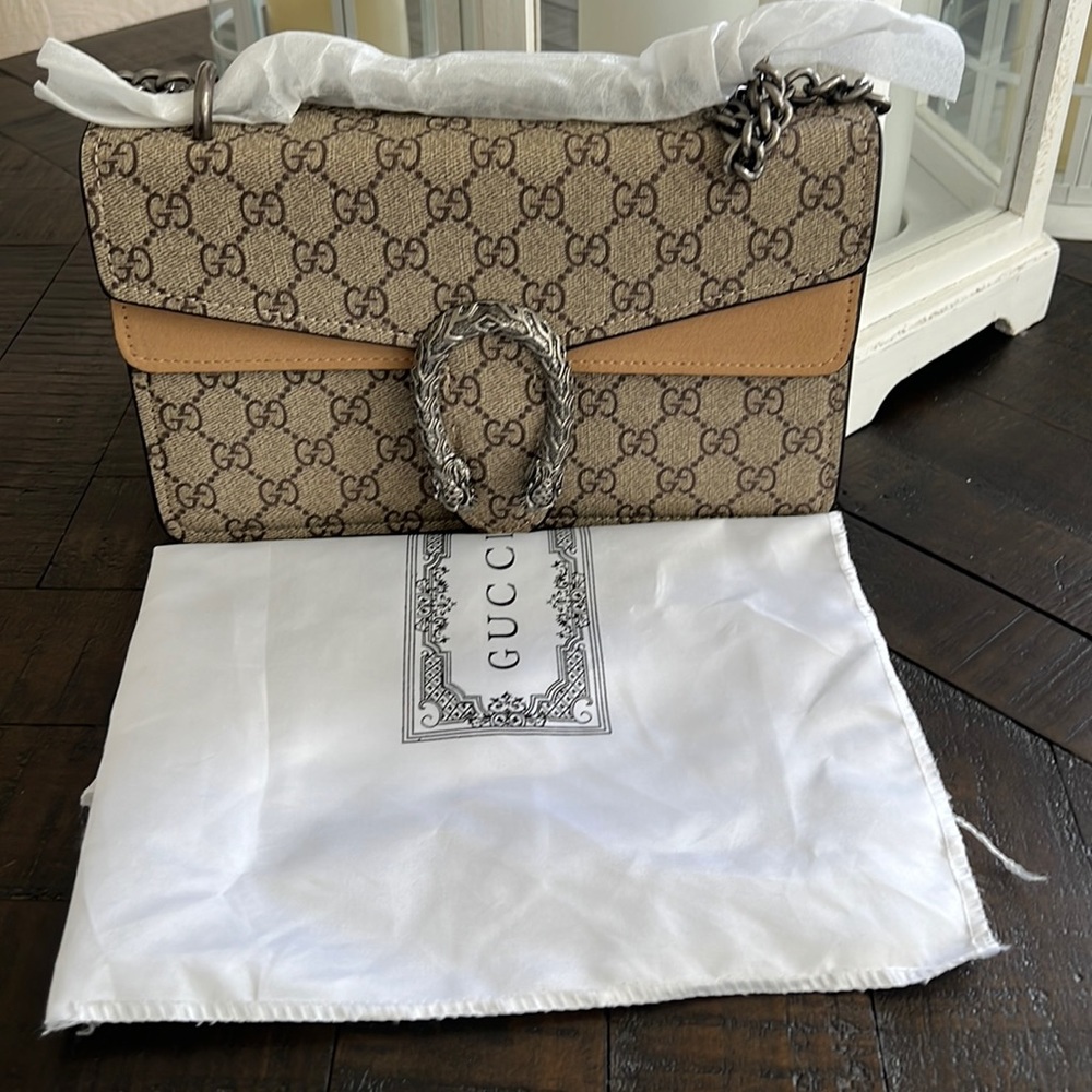 Leather bag with silver hardware